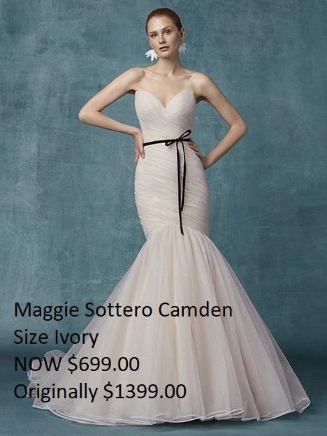 A woman is wearing a maggie sottero camden dress