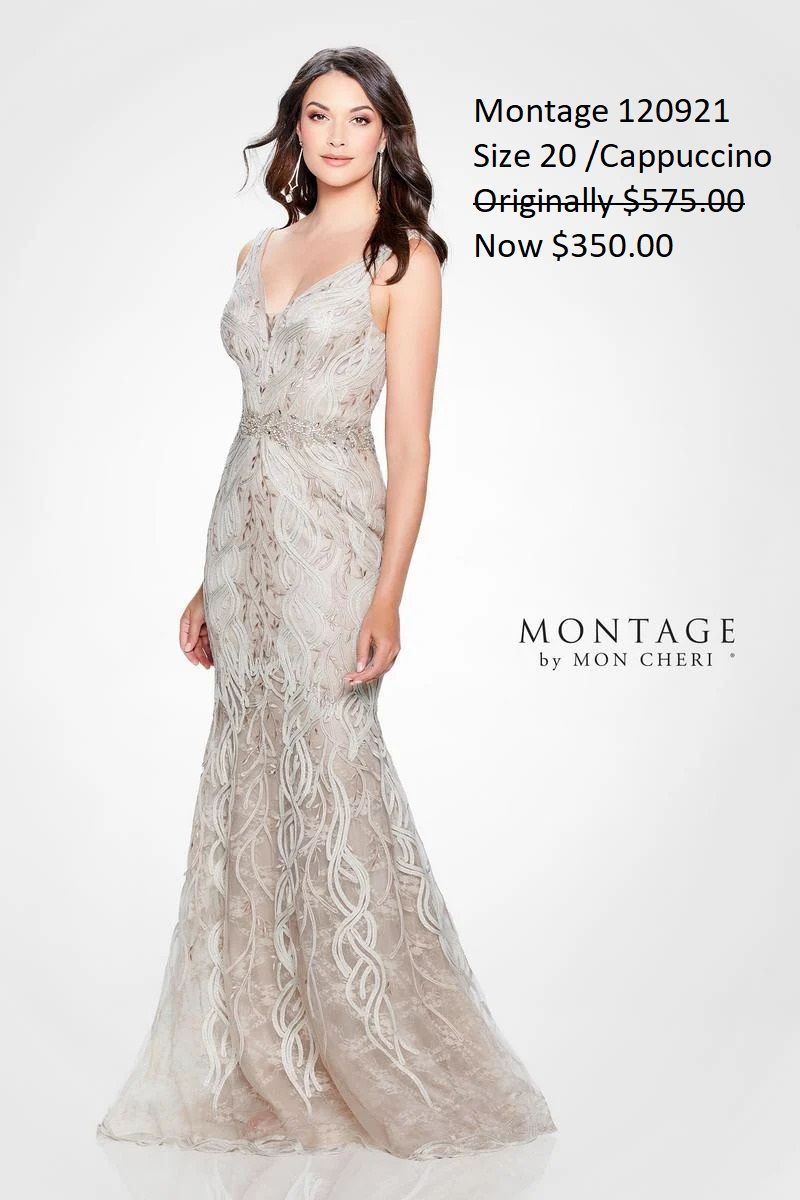 A woman is wearing a long white lace dress.