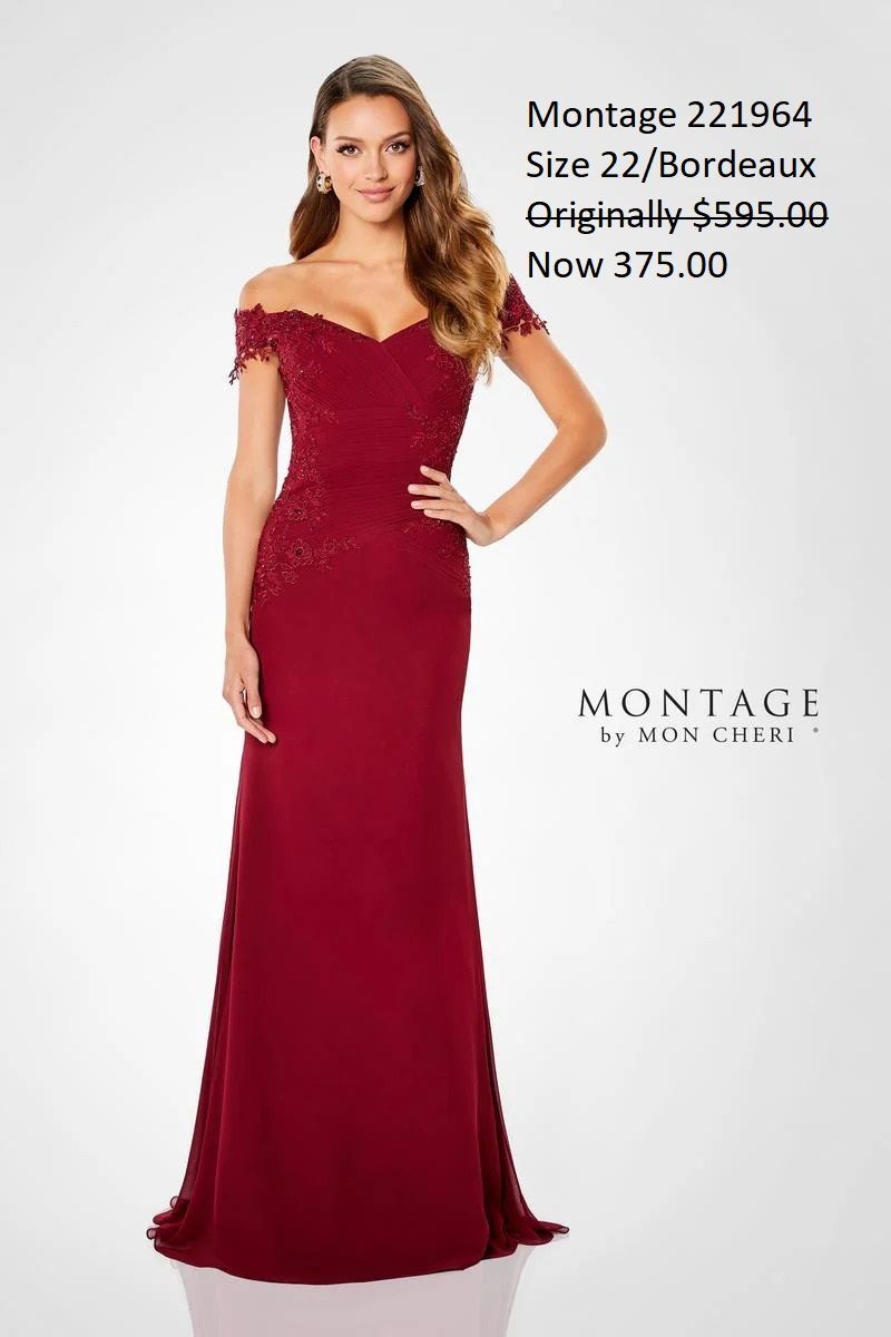 A woman is wearing a red off the shoulder dress