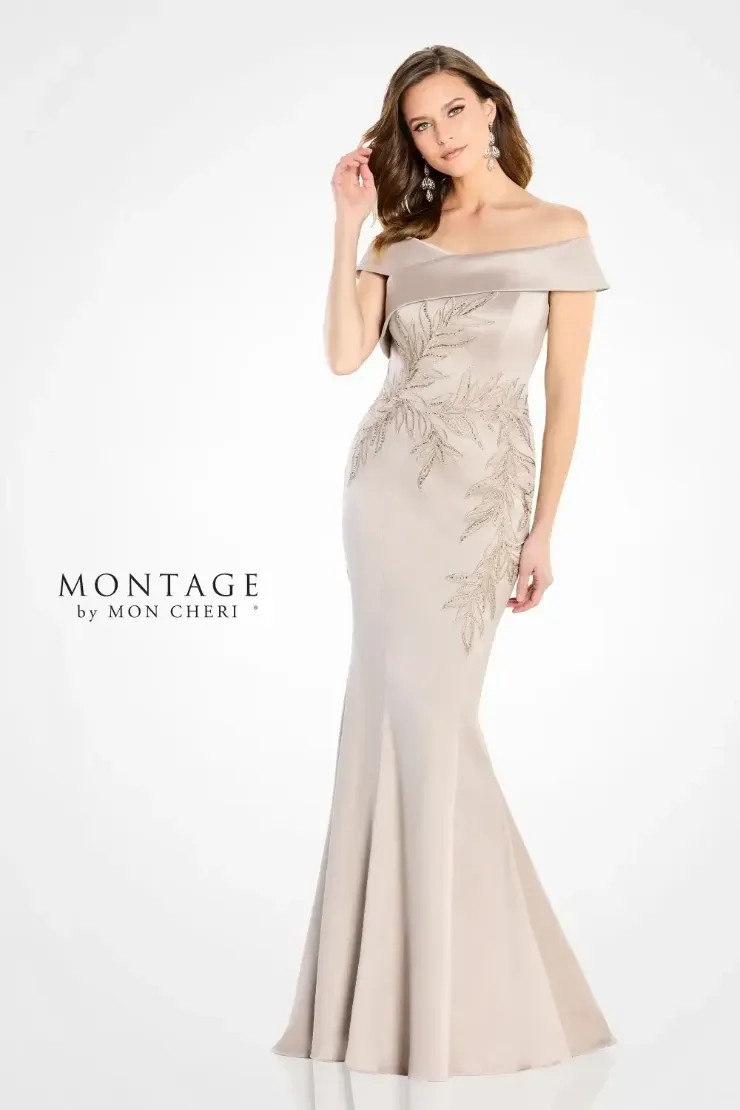 A woman is wearing a long off the shoulder dress.