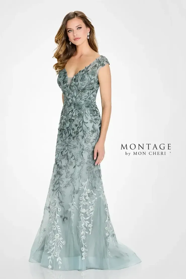 A woman is wearing a long green dress with a v-neck and short sleeves.