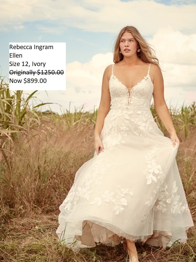 A woman in a white wedding dress is standing in a field. Rebecca Ingram Ellen