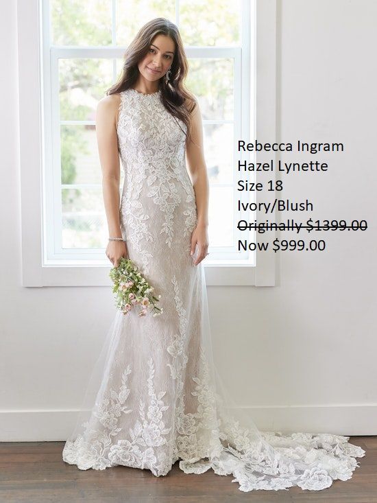 A woman in a wedding dress is standing in front of a window. Rebecca Ingram Hazel Lynette