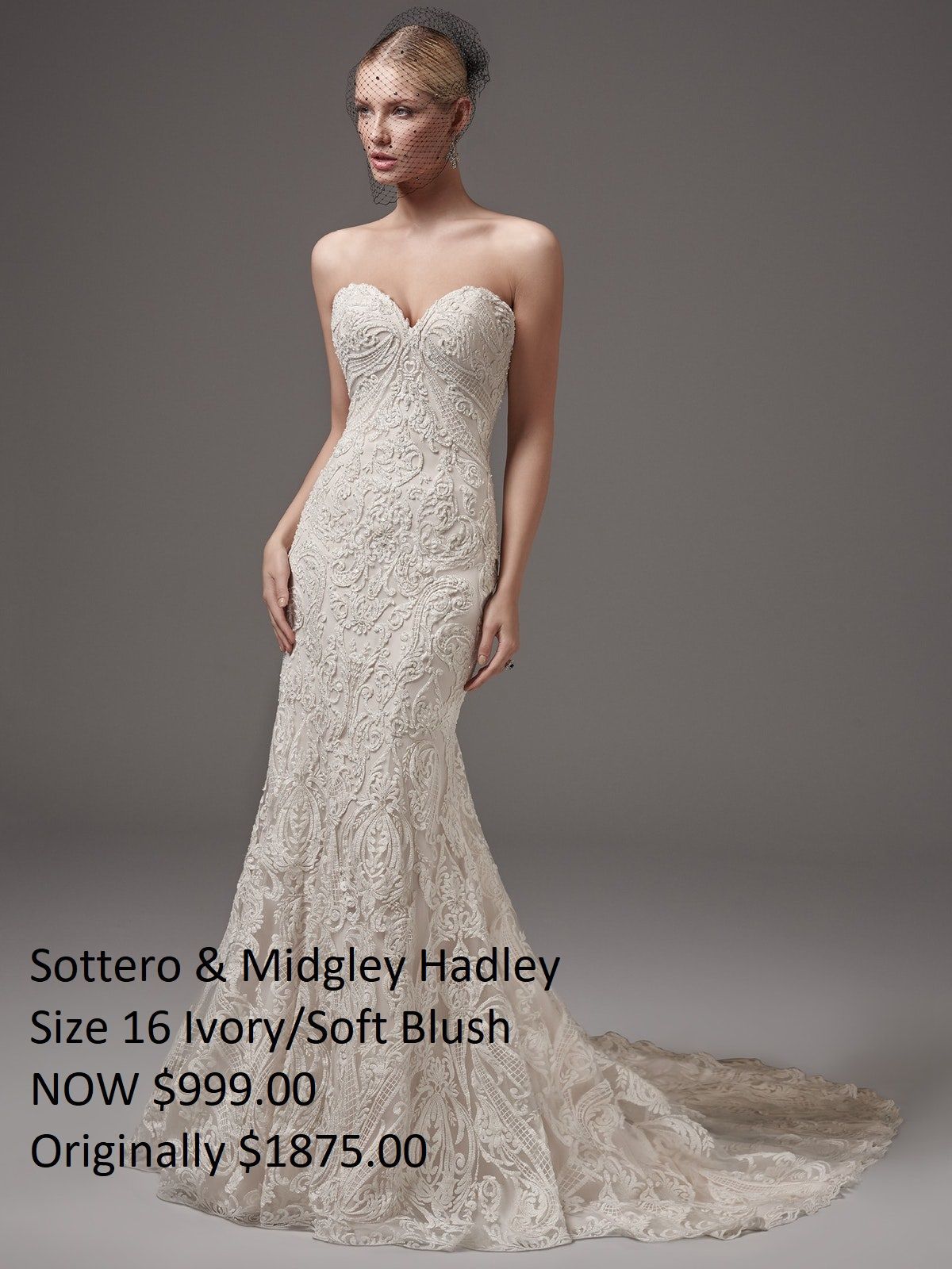 A woman is wearing a strapless lace wedding dress.