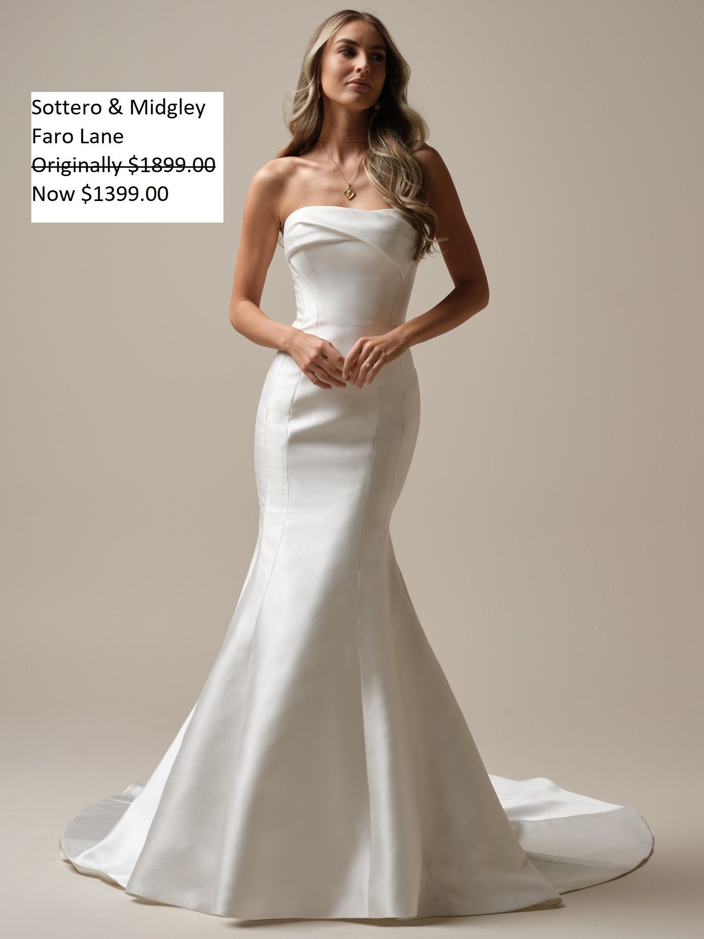 Woman wearing a white strapless mermaid wedding dress, standing indoors. Sottero & Midgley Faro Lane