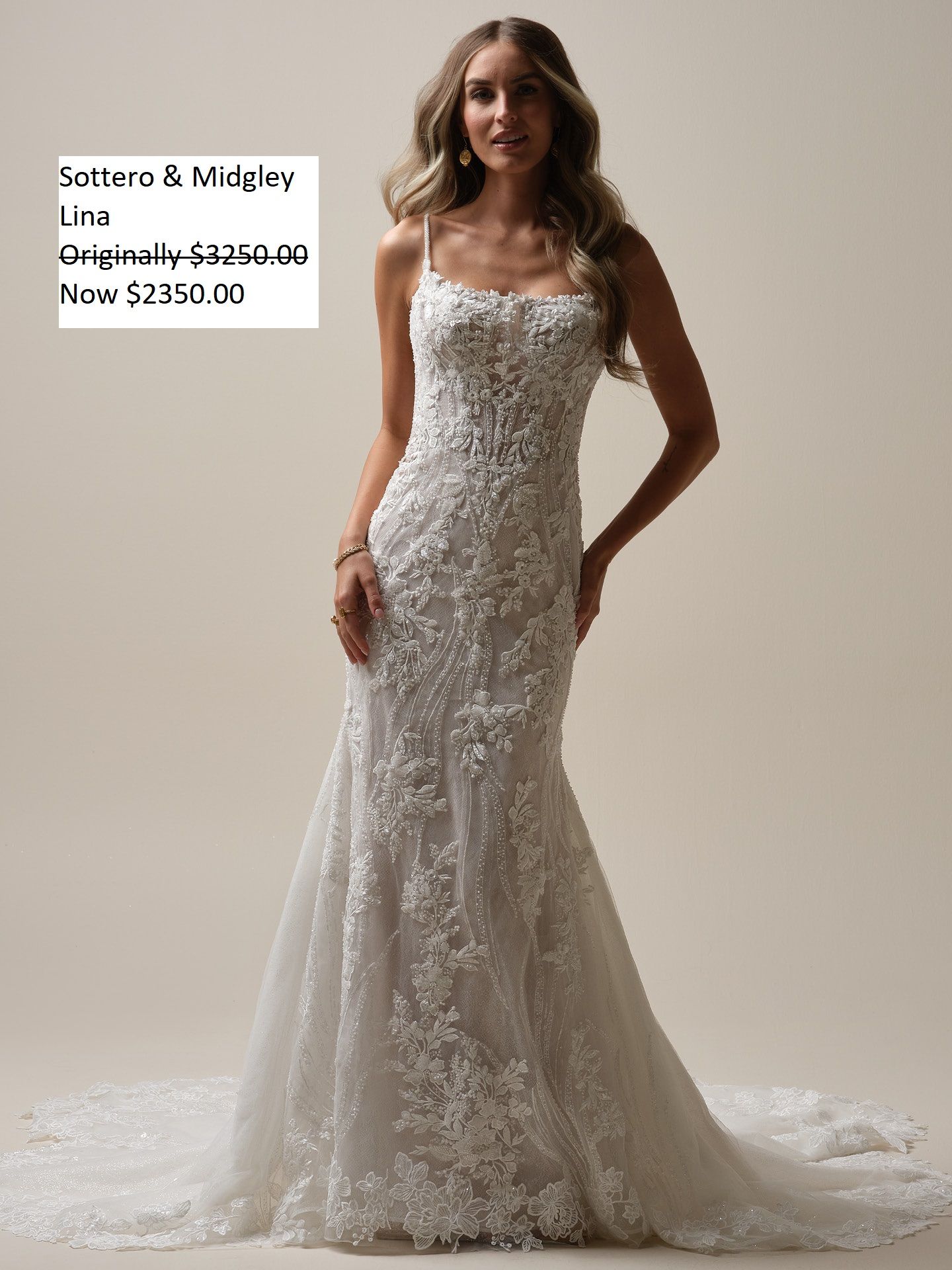 Woman in a white lace wedding dress, smiling, with price details: $3,250 originally, now $2,350. Sottero & Midgley Lina