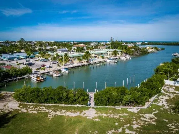 aerial view of property boat docks at Coco Plum Beach and Tennis Club and Marina in the Florida Keys