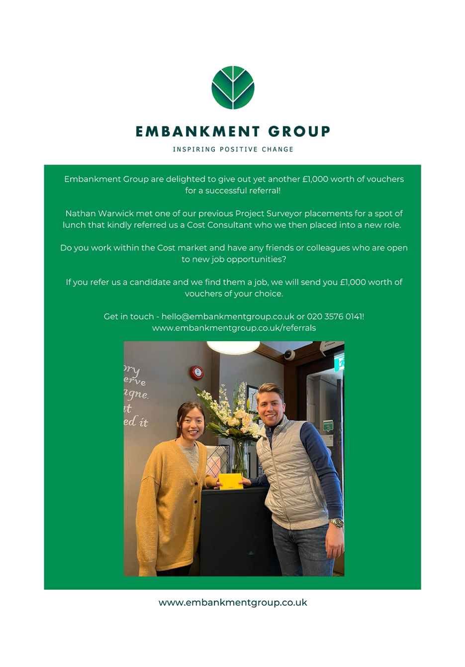 A man and a woman are standing next to each other in a room.