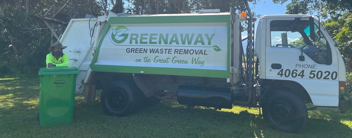 A Green and White Garbage Truck — Greenaway Green Waste Removal in O'Briens Hill, QLD