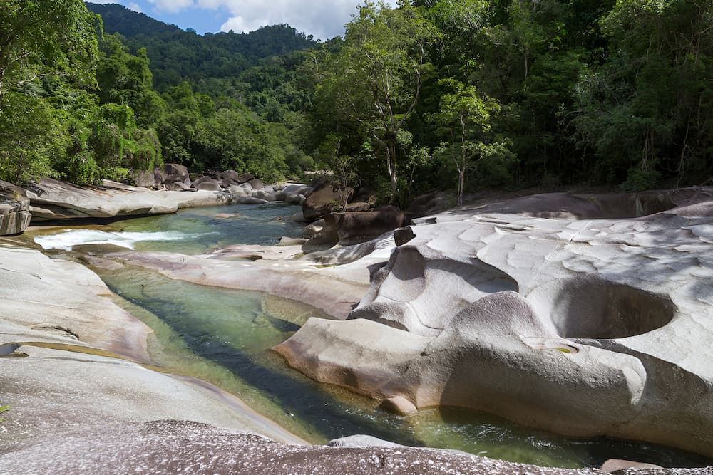 A River Flows Through a Rocky Landscape — Greenaway Green Waste Removal in Babinda, QLD
