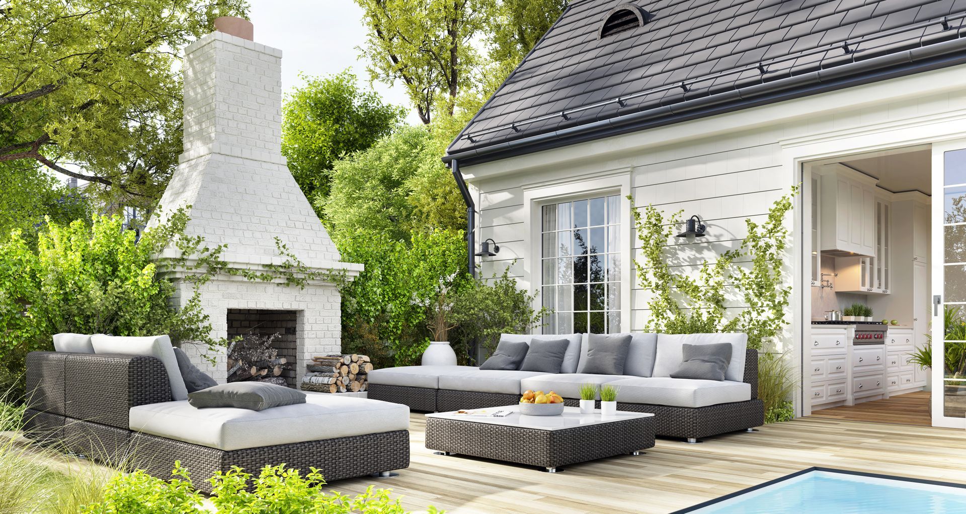 A cosy patio area with outdoor furniture, a swimming pool, and an outdoor fireplace.