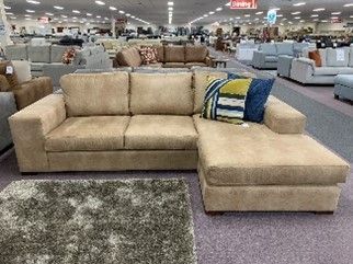 A modern sectional couch arranged at Furniture 'N' More.