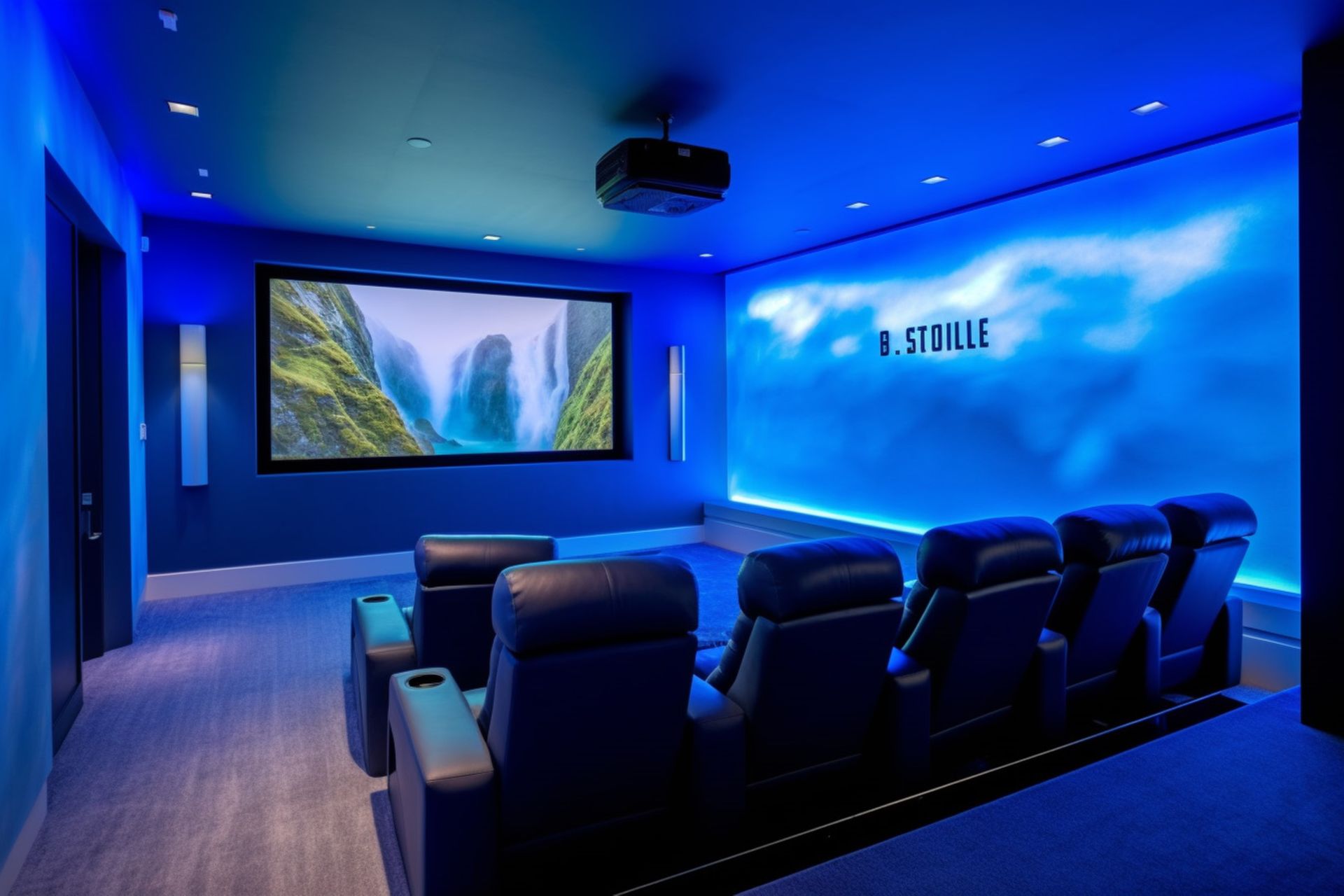 A home theater with a large screen and blue lights