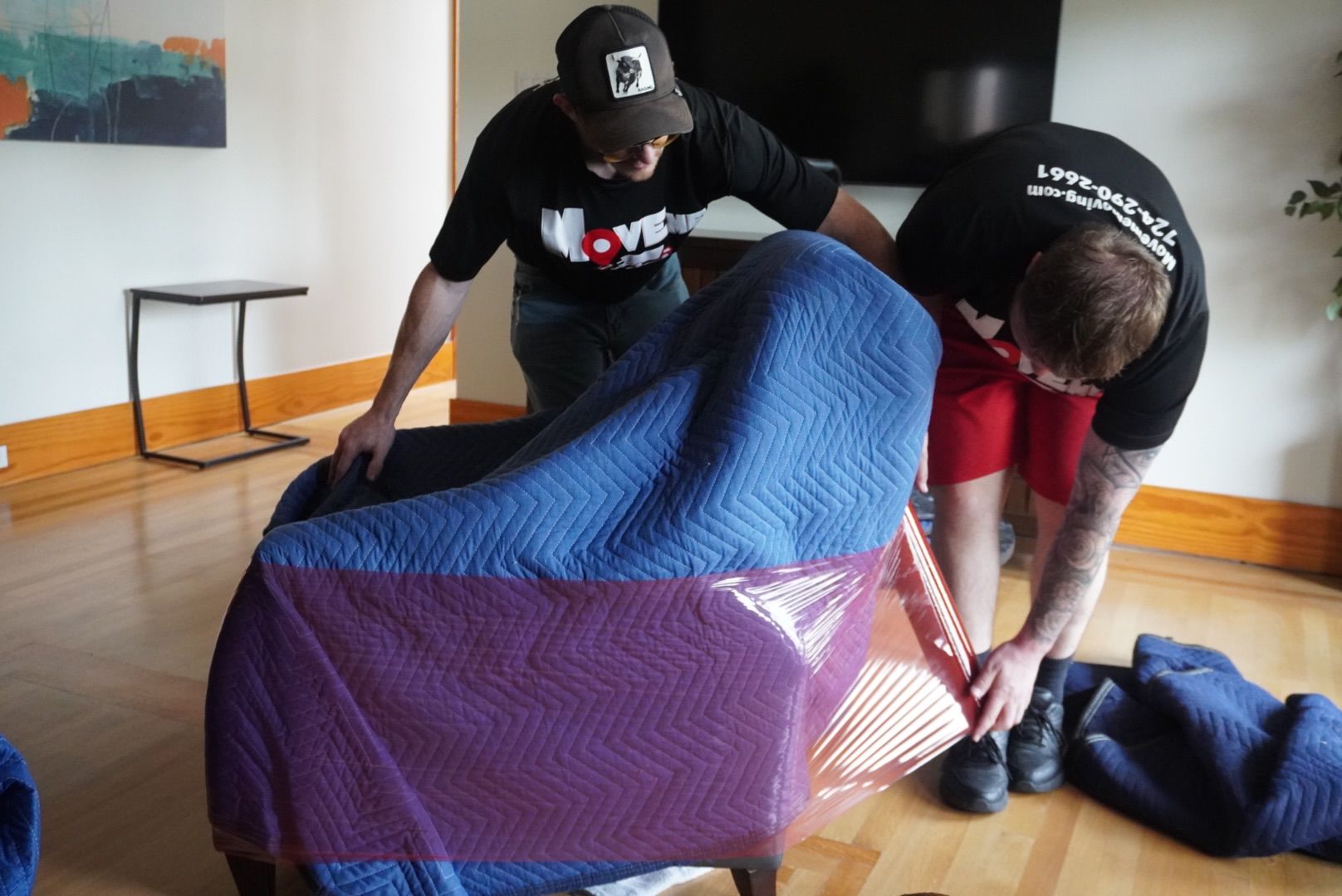 “Neatly stacked cardboard boxes ready for a residential move”