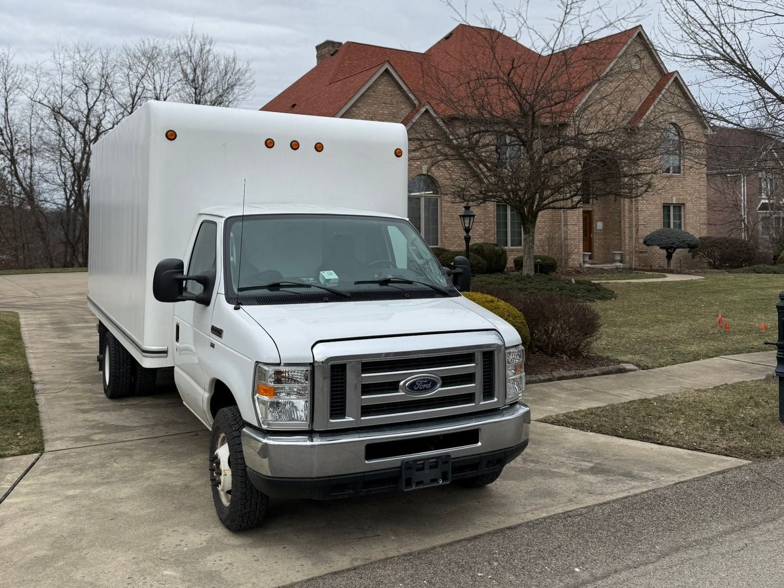 “Move Me Moving truck parked outside a residential property in Western Pennsylvania”