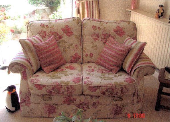 two seater upholstery with floral designs