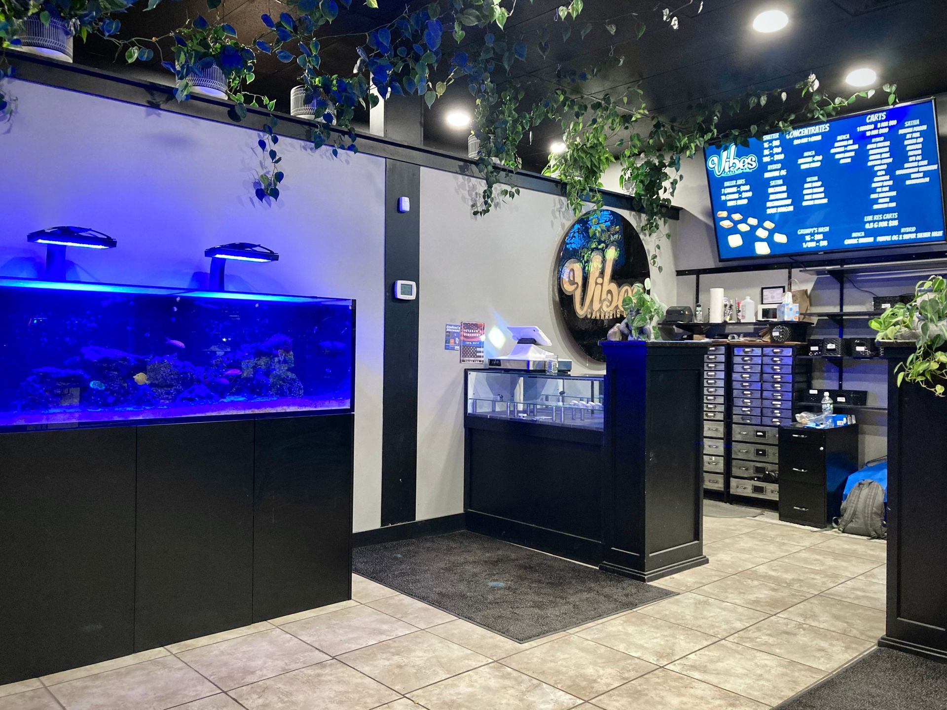 There is a large aquarium in the middle of the room.