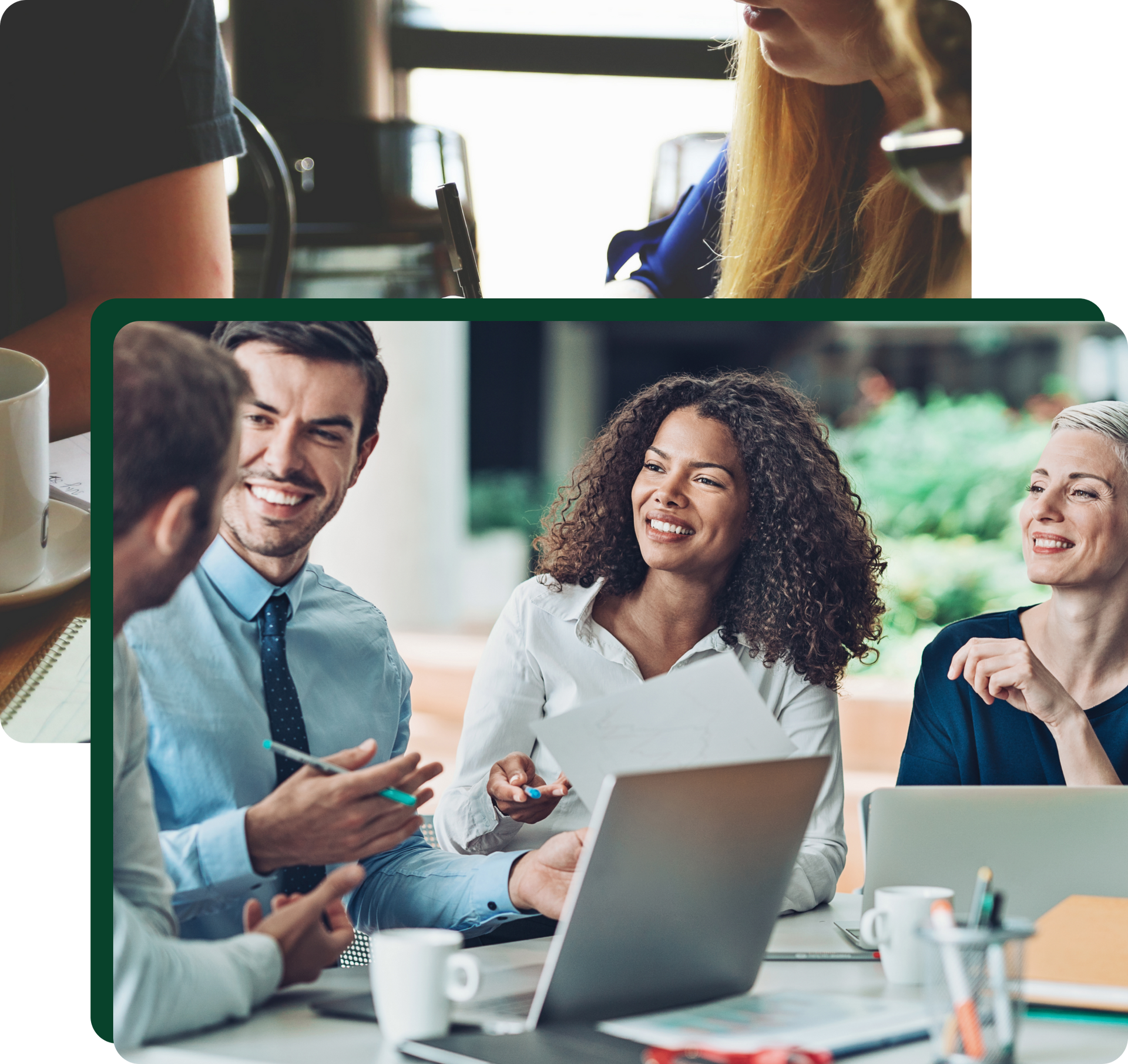 Group of people collaborating around a table with laptops, smiling and working together.