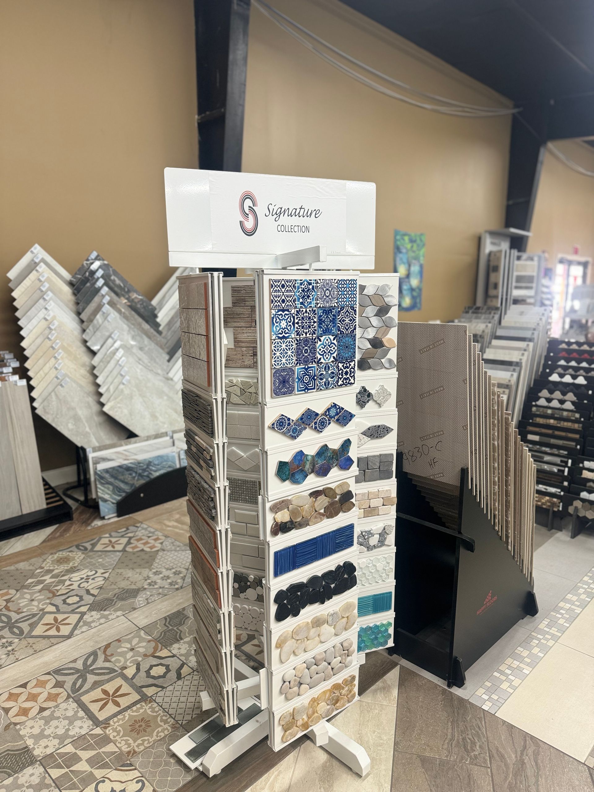 A display of tiles and carpets in a store.