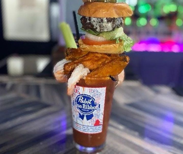 Sliderz Bloody Mary with a burger and shrimp