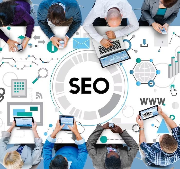 a group of people sitting around a table with the word seo in the middle