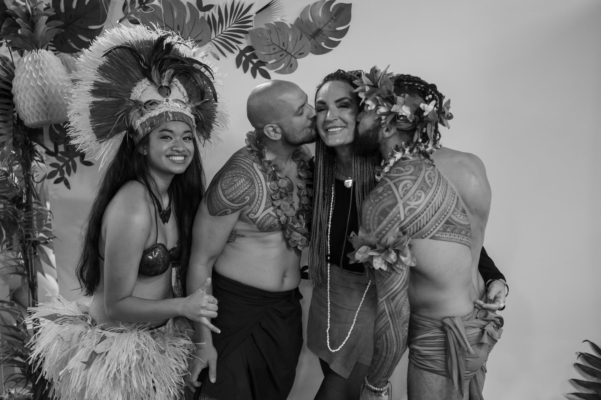 A black and white photo of a group of people posing for a picture.