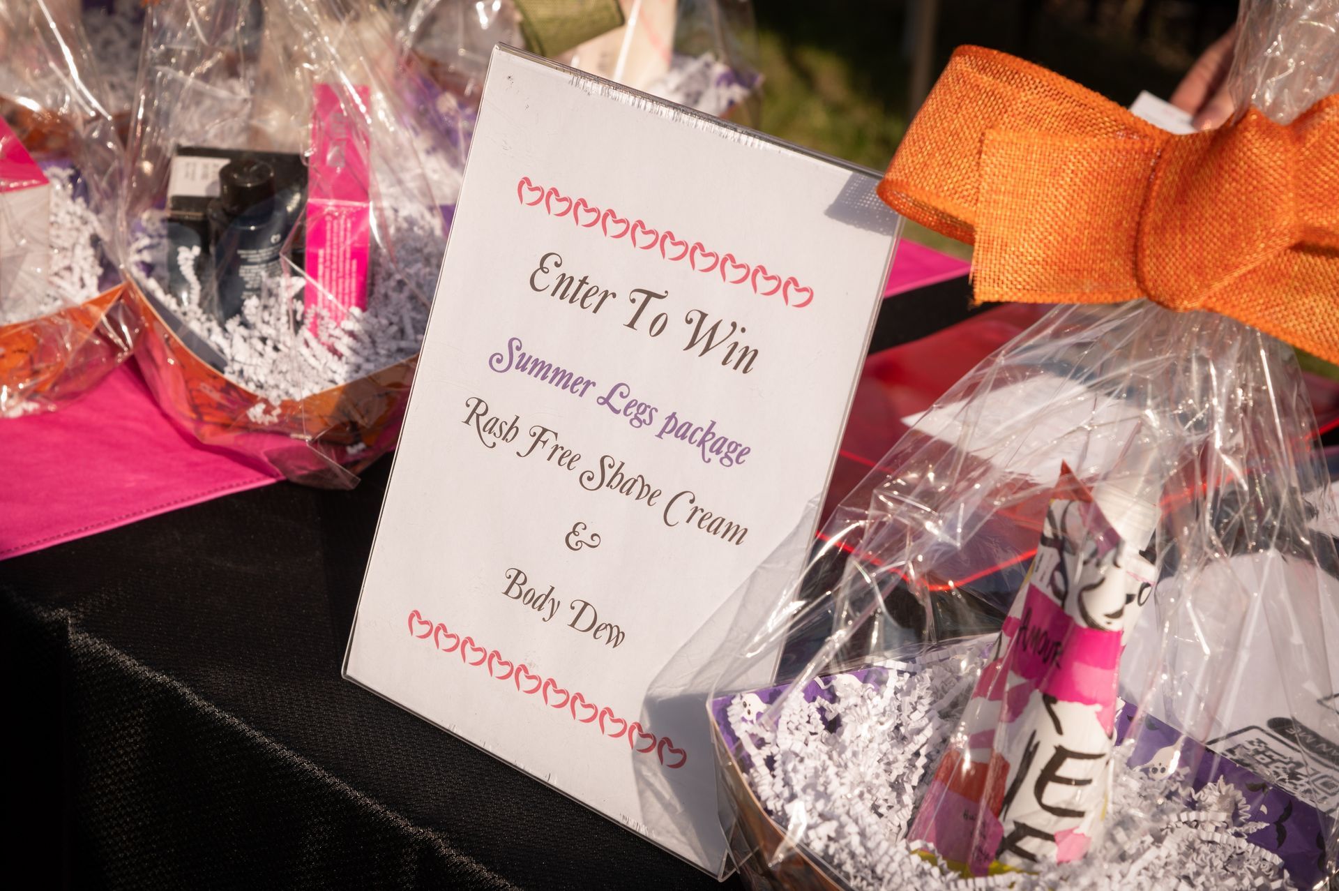 A sign on a table that says enter to win