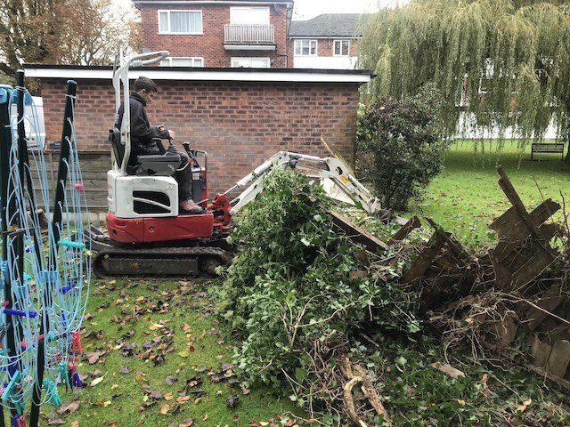 Work begins on a new patio with new fencing in Alderley Edge