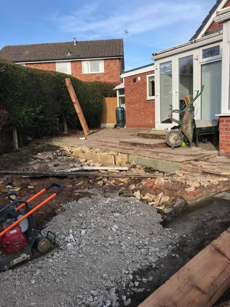 Work stars on a new block paved patio installation