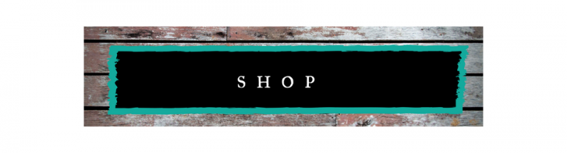 A sign on a wooden wall that says `` shop ''.