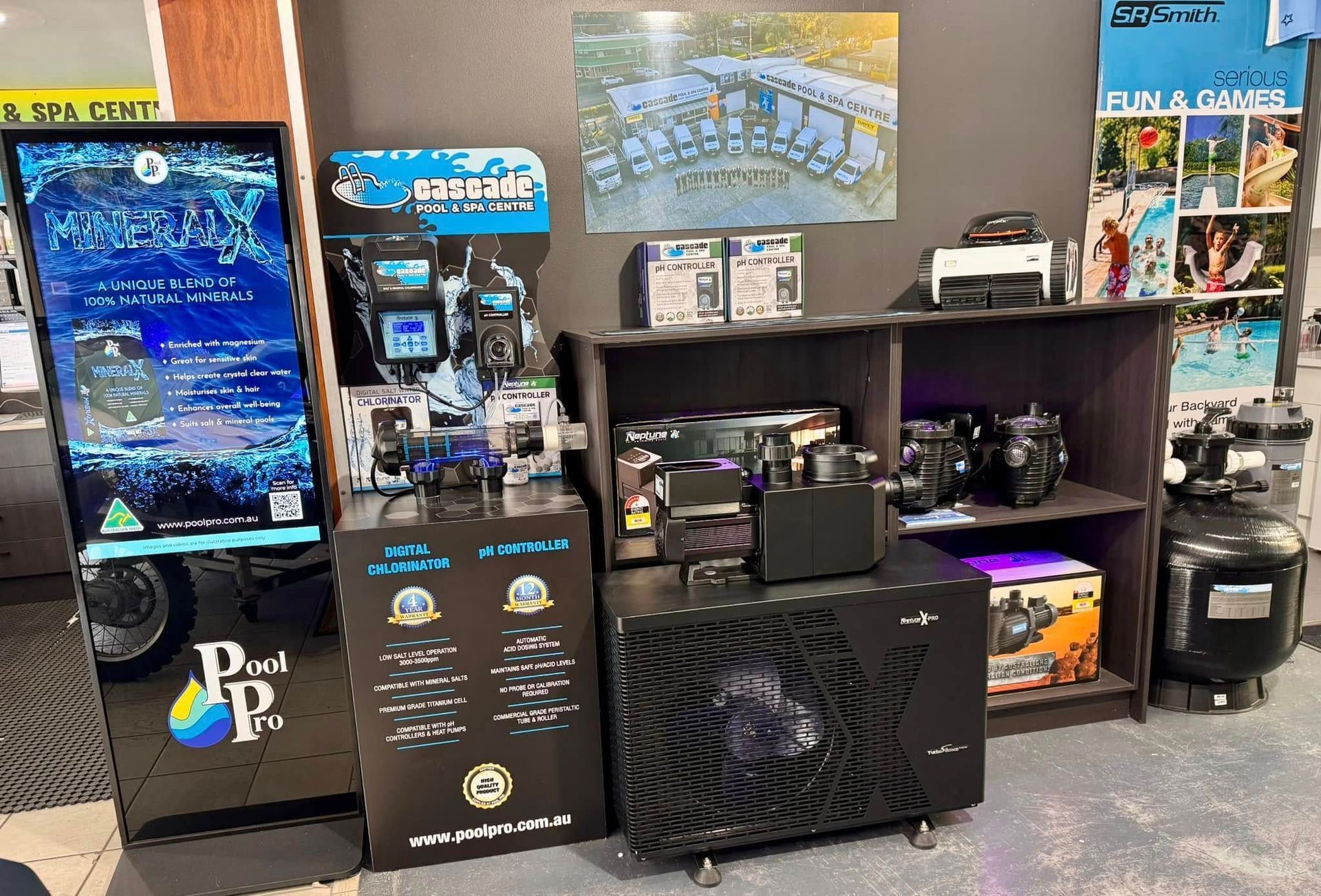 A Pool Equipment Display Inside a Store With Informational Signage and Various Products — Cascade Pool & Spa Centre in Port Macquarie, NSW