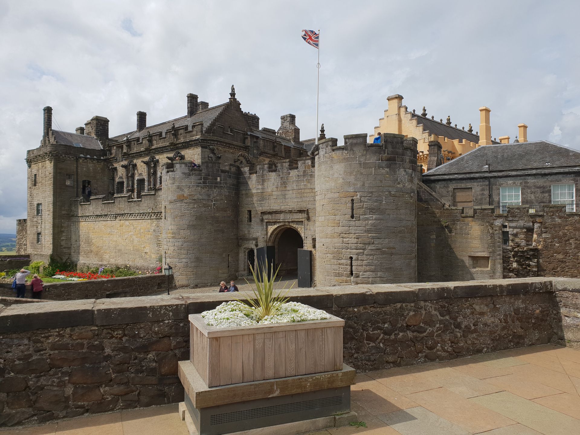 Stirling Castle perched atop a volcanic crag, overlooking the Scottish countryside, showcasing its m