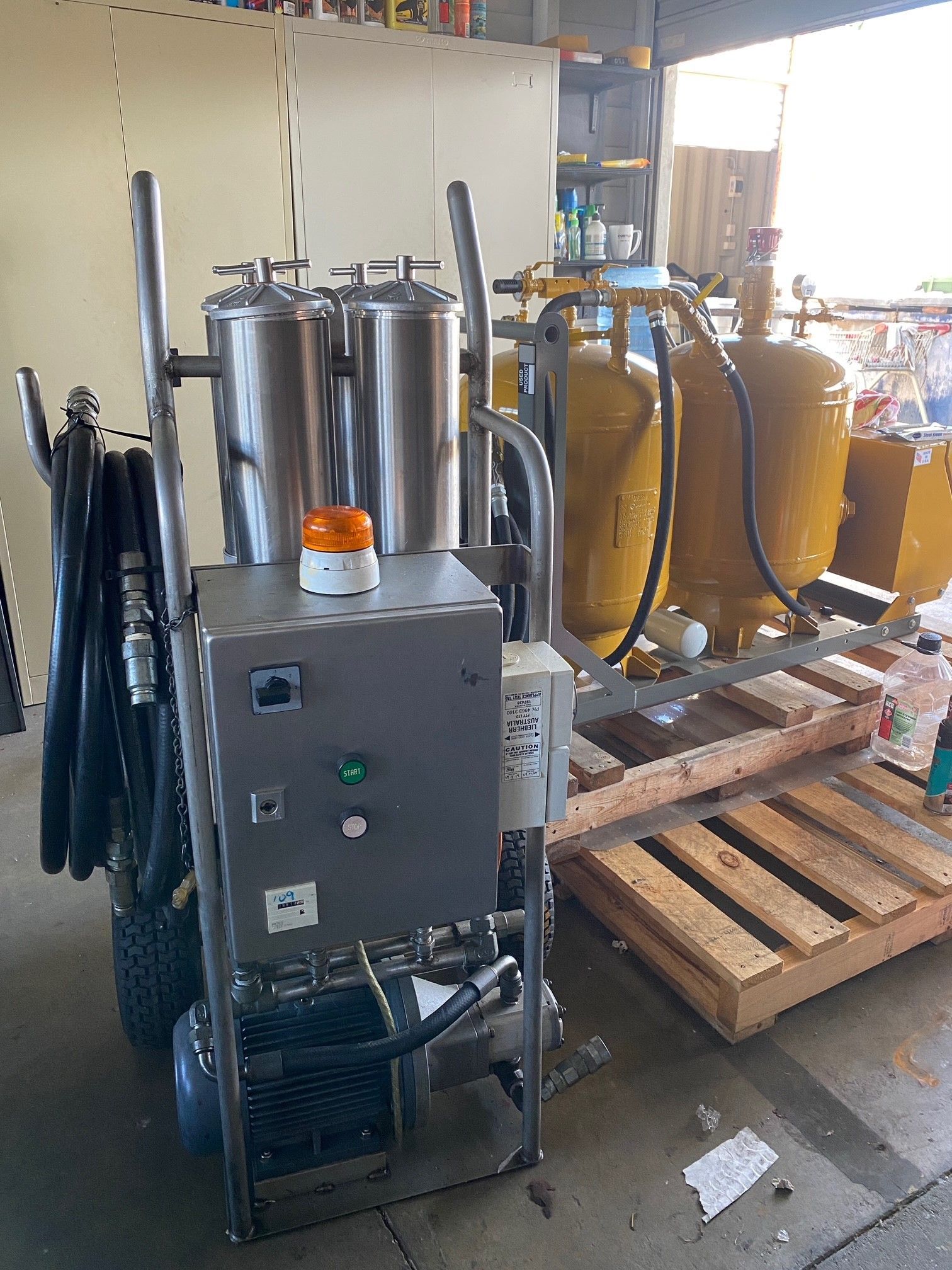 A white truck is parked in front of a 7 eleven store