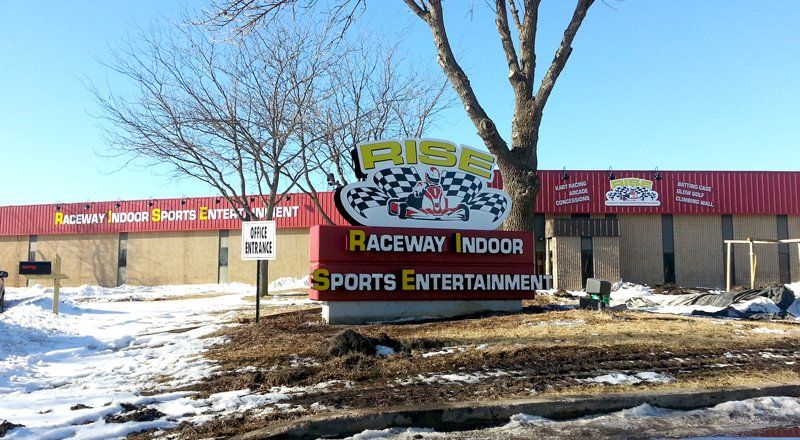 Wood Signs — Raceway Indoor Sports Entertainment in Harrisburg, SD