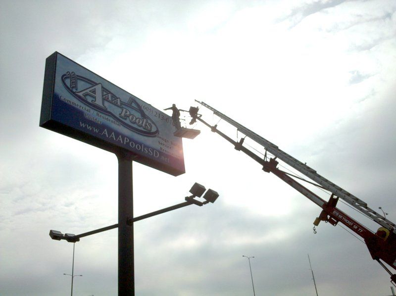 Graphic Sign — AAA Pools billboard in Harrisburg, SD
