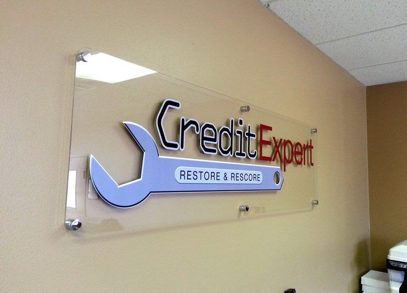 Custom Graphic Signs — Credit Expert in Harrisburg, SD