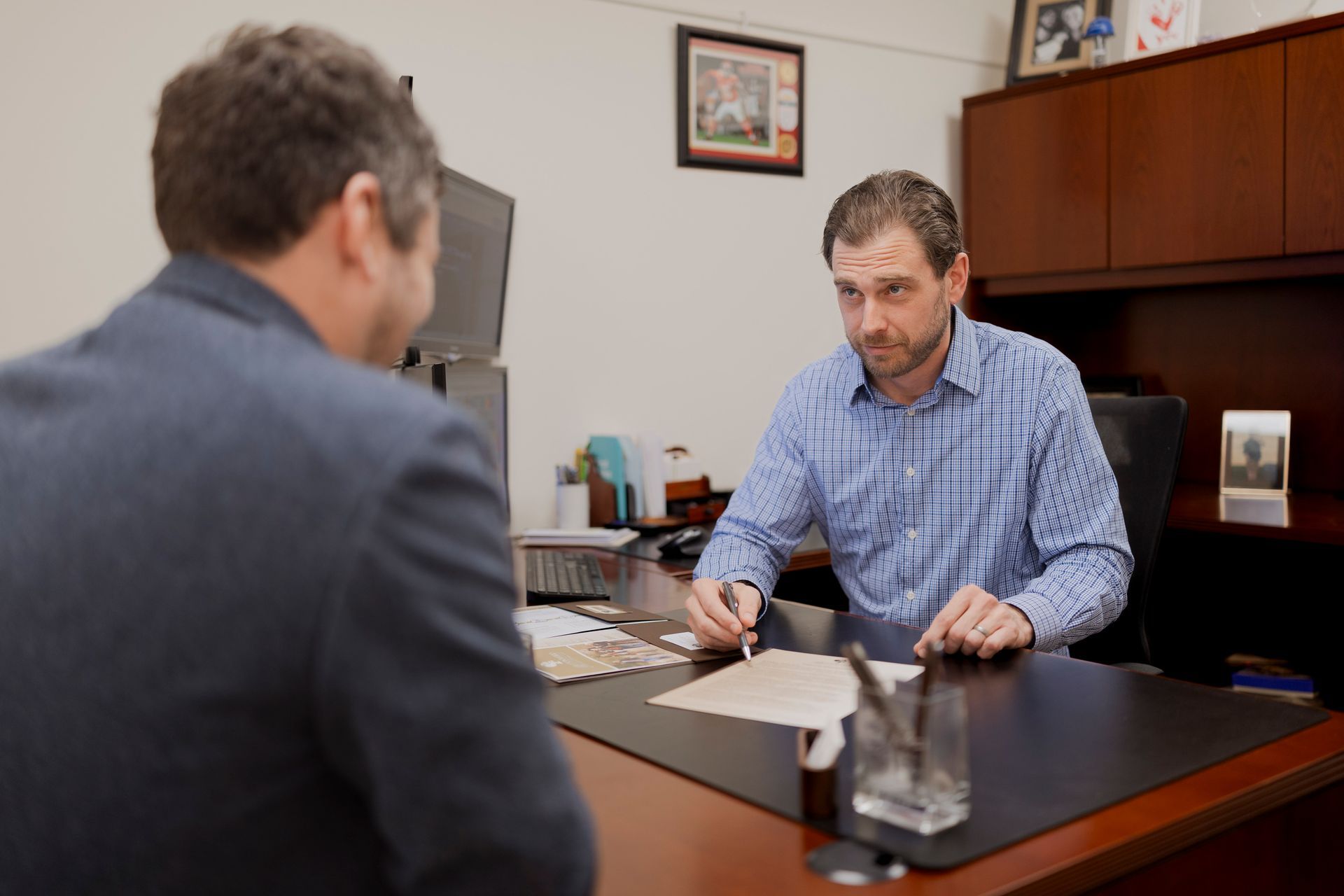 Two financial advisors discussing retirement planning 