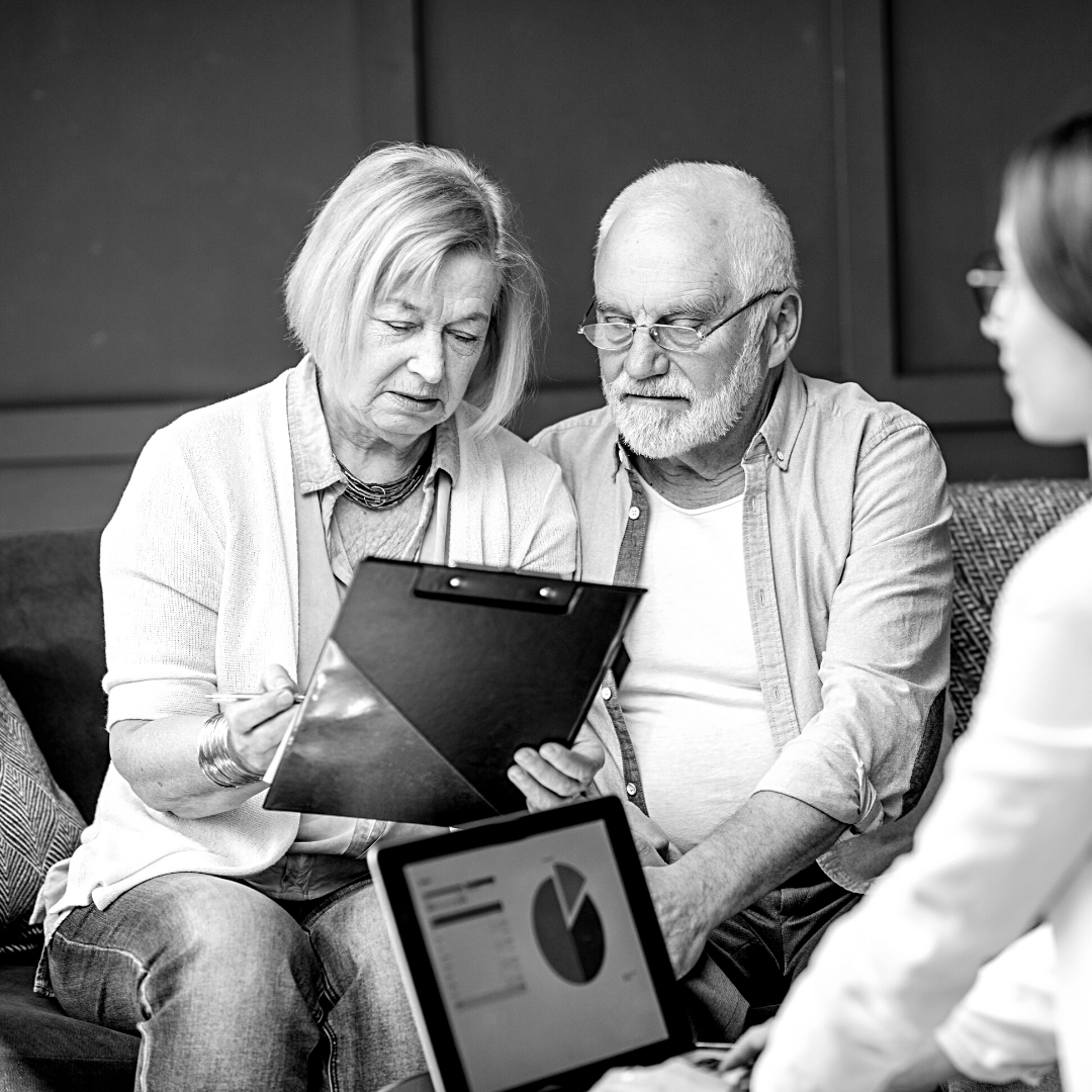 older couple looking over papers