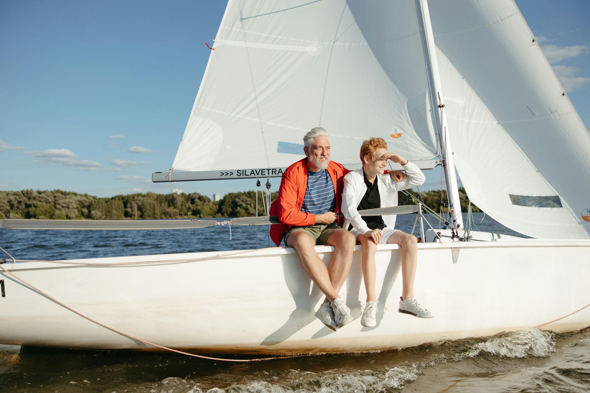 Two people on a sailboat enjoying retirement after implementing the Mega Backdoor Roth IRA strategy