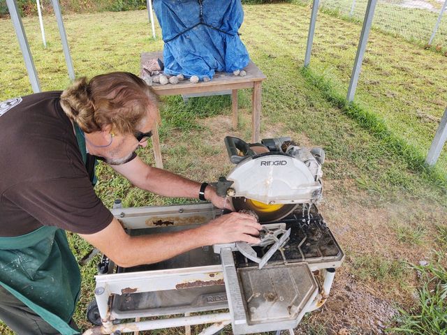Man Cutting Geodes Stone