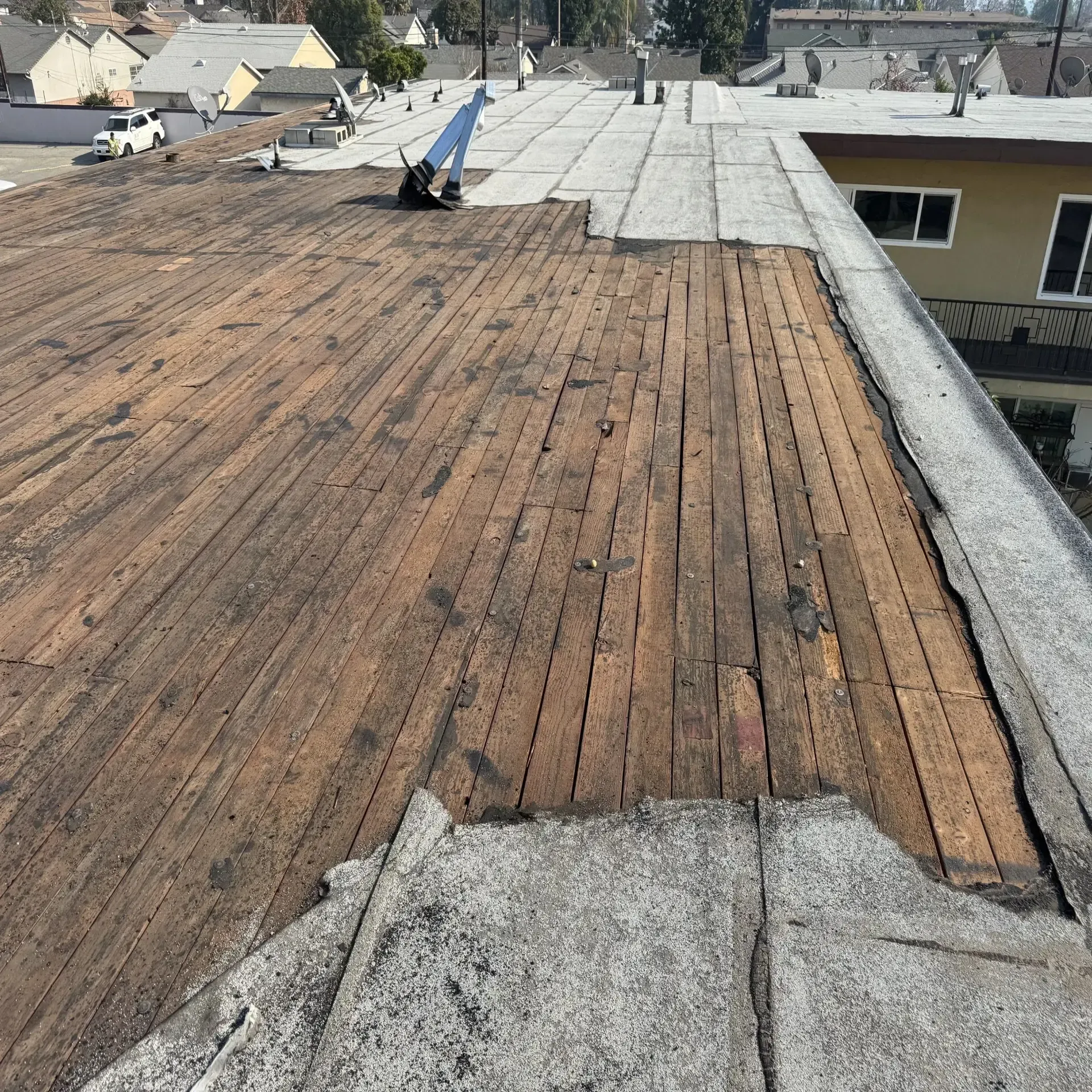A roof with a lot of wood on it