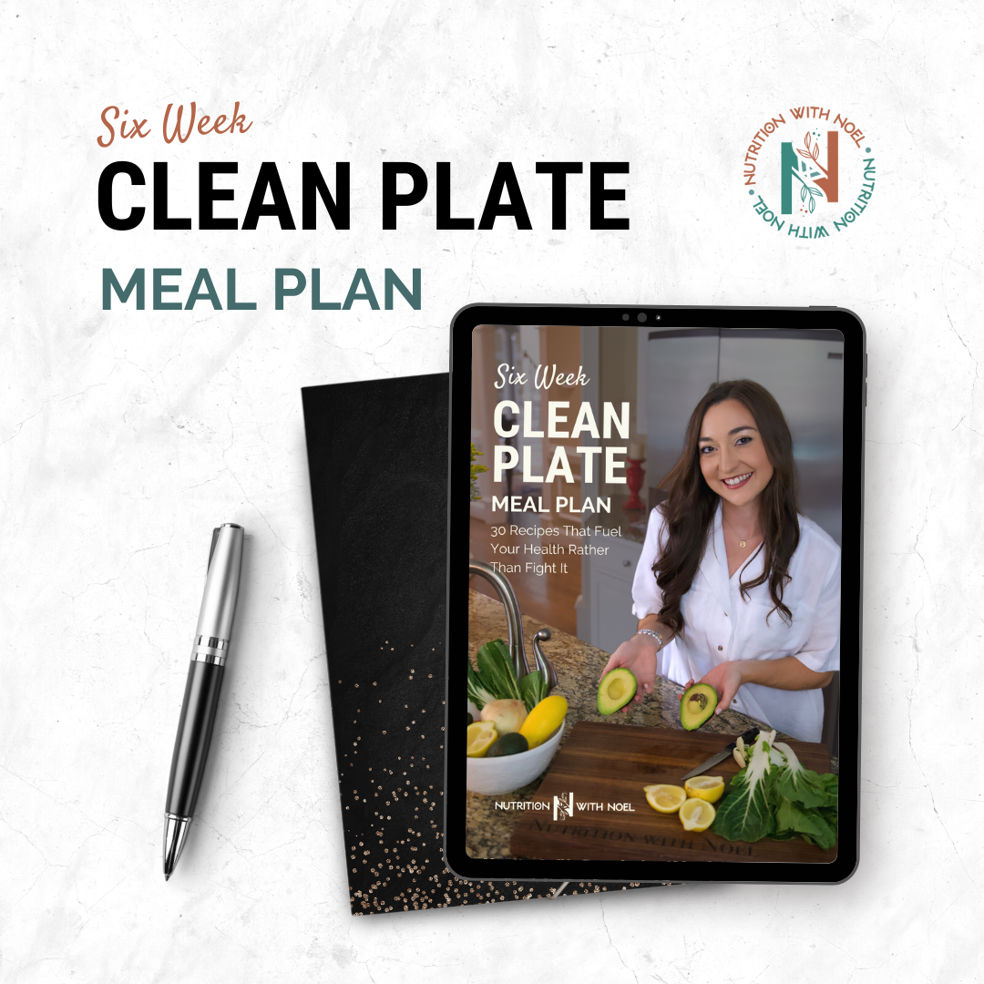 A clean plate meal plan is on a tablet next to a pen.