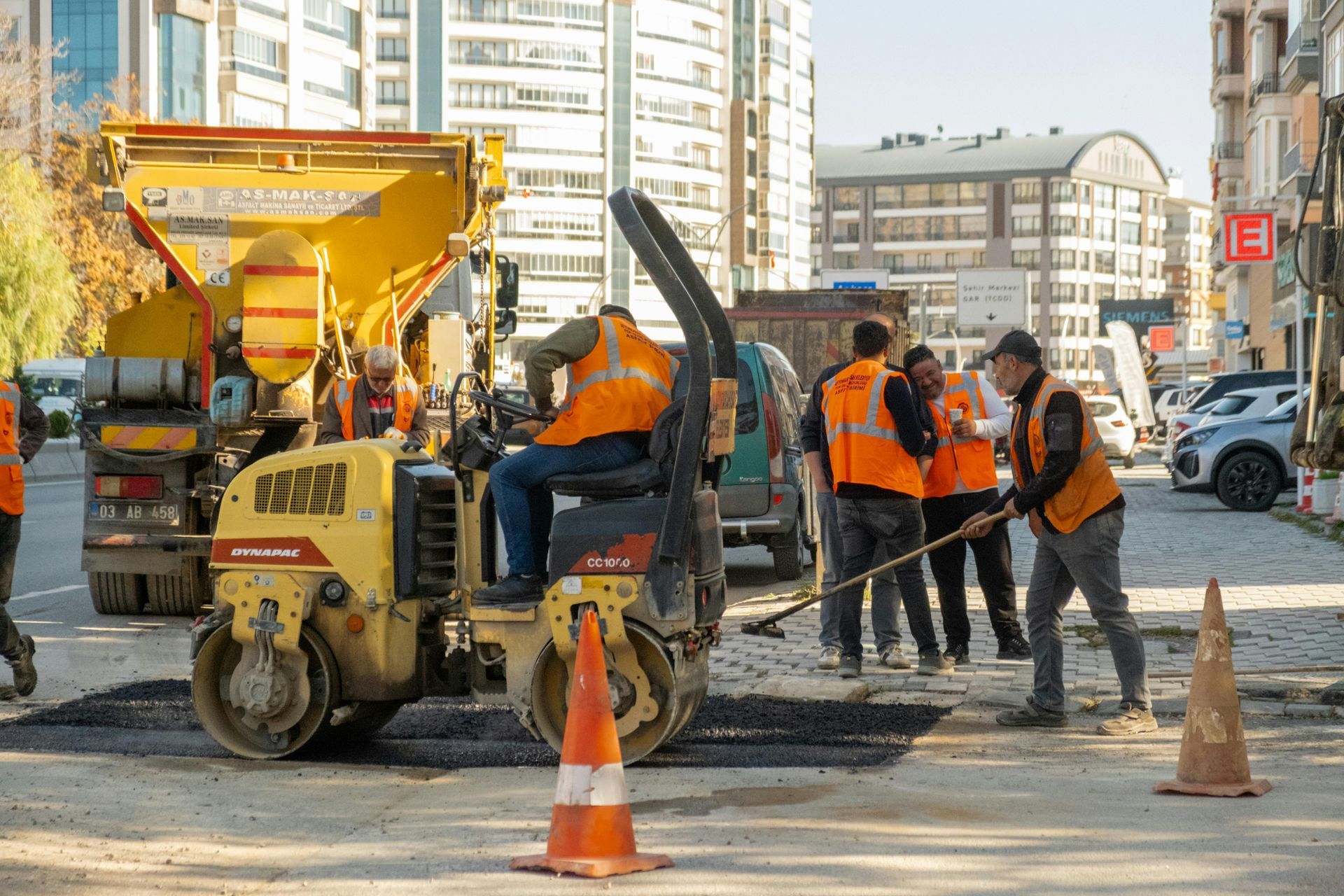 Construction team Re-asphalting a cross walk