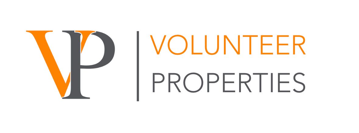 Volunteer Properties logo: orange 