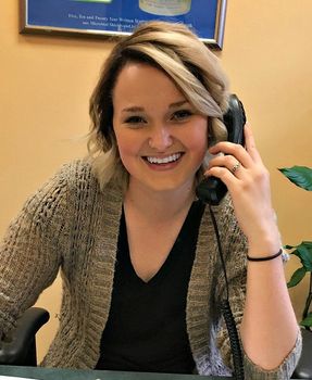 woman on phone in Anabec office