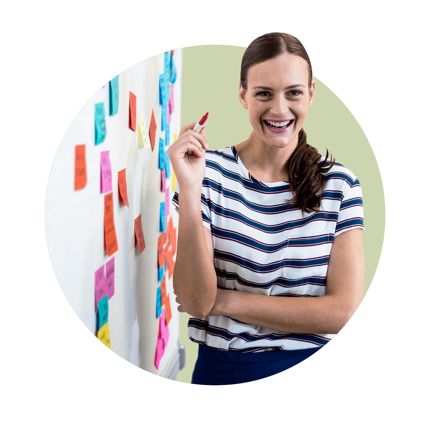 Woman smiling to camera next to whiteboard with many colourful sticky notes