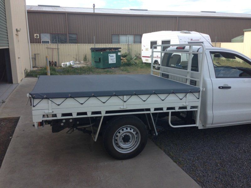 Read view of a blue color automobile