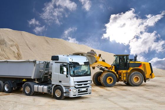 truck being loaded with gravel