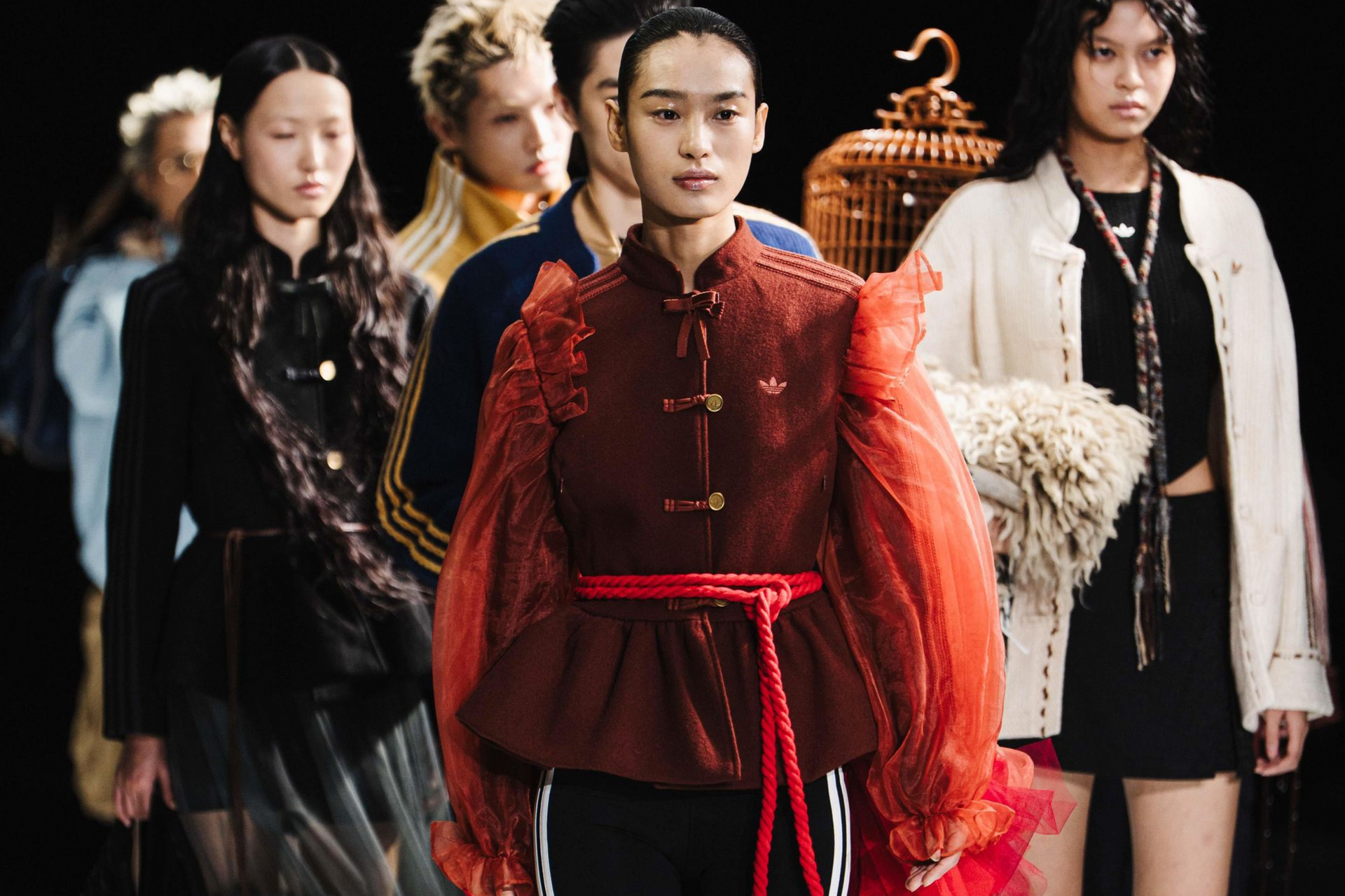 Models wearing Adidas’ “Tang-style” jackets. Photo: Adidas Power of Three