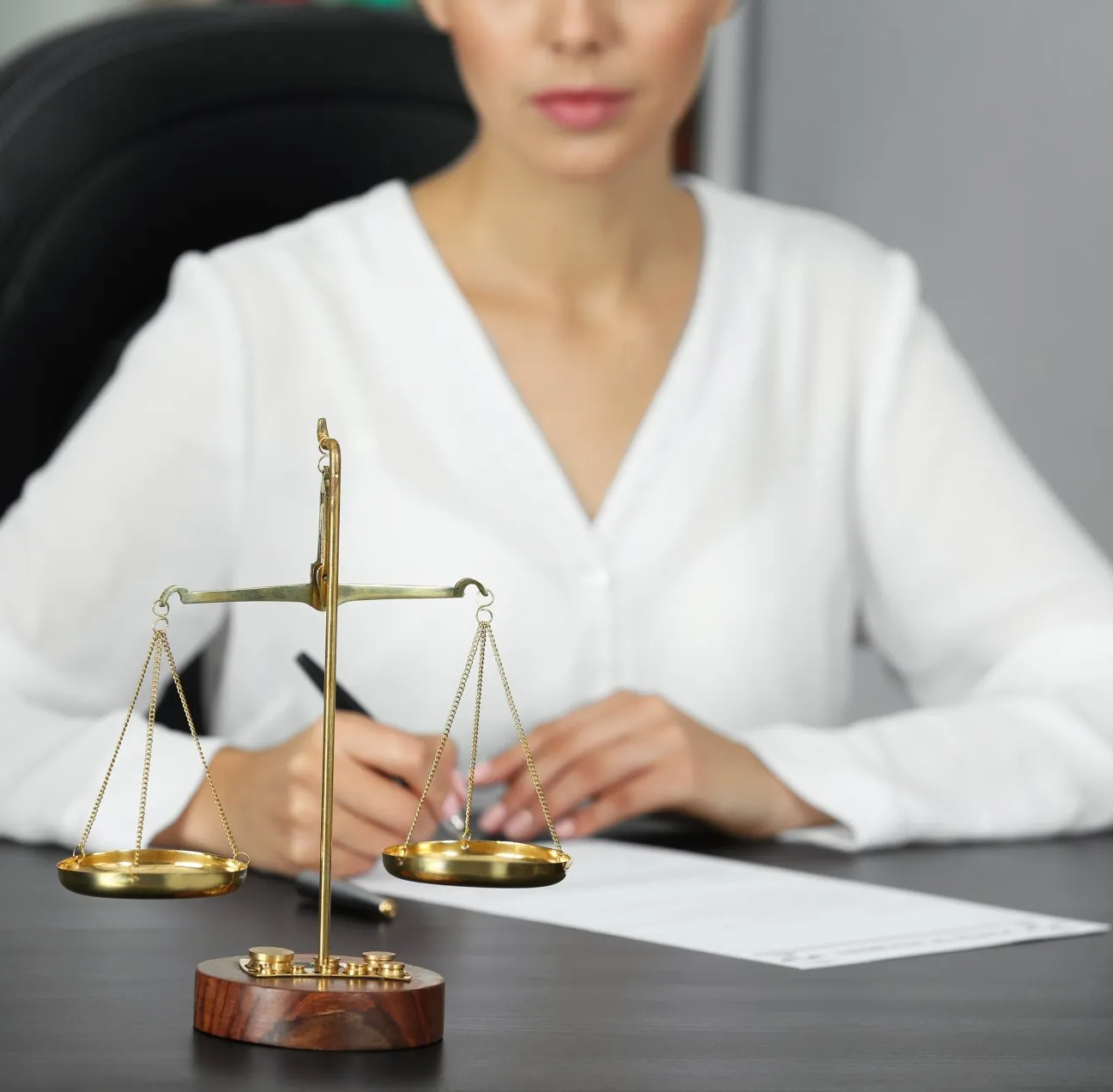 Woman Signing Papers — Conveyancing Central Coast, NSW